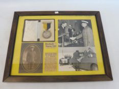 A framed and glazed AA Patrol Service medal for merit with associated black and white photographs