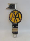 An AA small version committee badge, motorcycle type 2A-B, stamped OC102, produced 1951-1966.