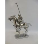 Lejeune - a well detailed accessory mascot in the form of a polo player in action, stamped
