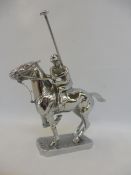 Lejeune - a well detailed accessory mascot in the form of a polo player in action, stamped