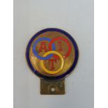 An Alliance INternationale de Tourisme brass and enamel car badge, enamel with a repair.