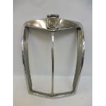 An MG TF chrome plated radiator cowl.