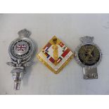 An RAC of South Africa car badge, a J.R. Gaunt London/Scottish badge and one other.