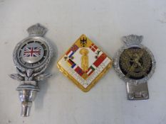 An RAC of South Africa car badge, a J.R. Gaunt London/Scottish badge and one other.