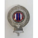 A Royal Automobile Club Associate car badge with Civil Service enamel centre, no. F57425.