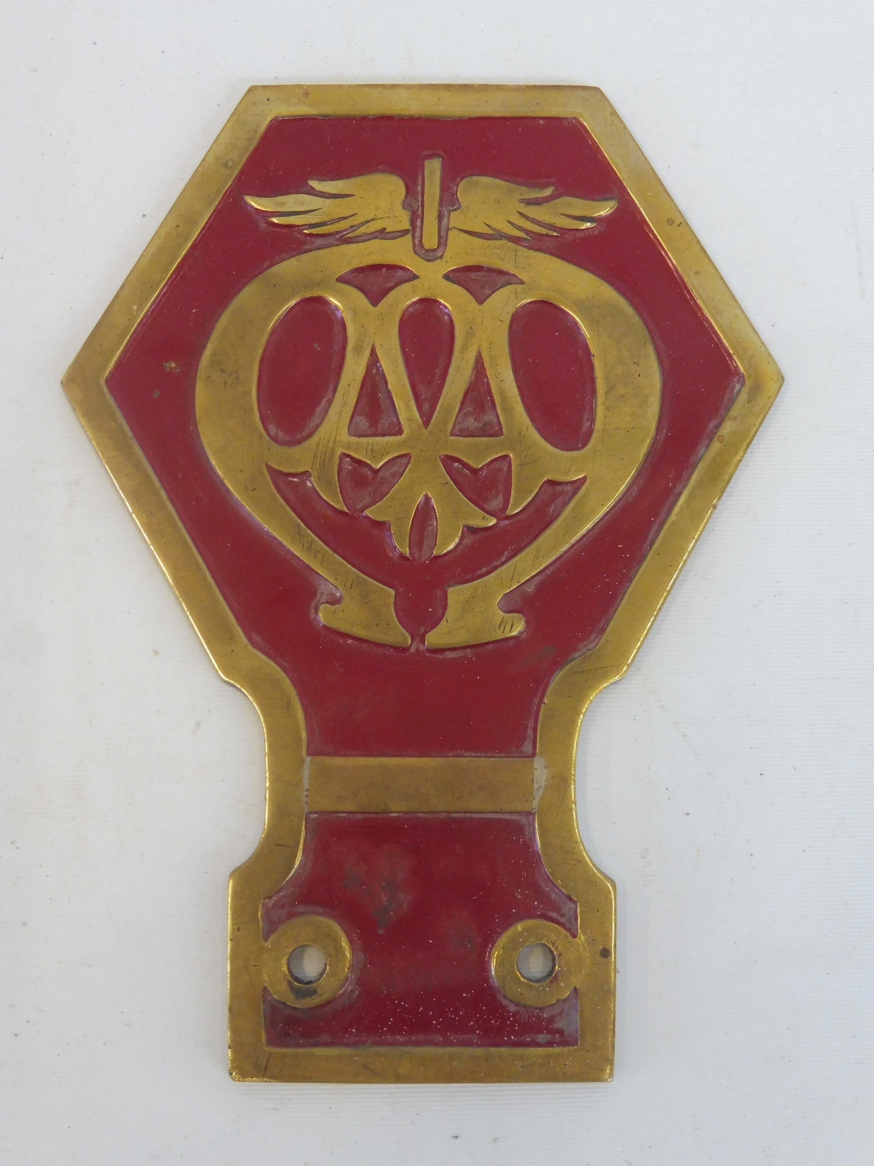 An AA brass commercial badge, may be a prototype as bar added.