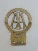An early AA Stenson Cooke type 2A car badge, circa 1906-1908, stamped 5425, nickel, possibly solid.