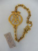 A rare and possibly unique gilded AA badge and chain, by repute removed from the chandelier at Fanum