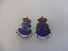 Two RAC 1947 anniversary year enamel lapel badges.