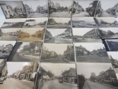 Approximately 38 early black and white photographs, circa 1918-34 depicting street scenes, all