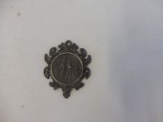 A 1905 silver medal awarded to J.G.C Doull for a 41 mile cycle race, 2hrs, 6 mins and 32 seconds.