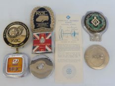An RAC 20th International Rally 1971 badge, a J.D. Power RAC award badge, an RAC Top 50 Patrol Award