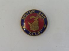 A rare Motor Car Club enamel lapel badge by Collins of London.