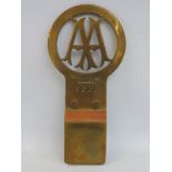 An AA Stenson Cooke type 3 brass car badge, designed to fit the dashboard of certain car marques,