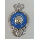 A rare Royal Automobile Club 1953 prototype badge, as featured on the prominant image on page 87