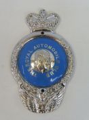 A rare Royal Automobile Club 1953 prototype badge, as featured on the prominant image on page 87