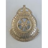 A WWII Ministry of Supply 'Official Car Services' car badge.