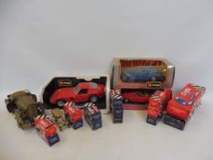 A box of larger scale die-cast model cars including Burago, featuring a Bugatti and Ferraris, plus