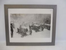 A framed and glazed black and white photograph of the start of a pre-war grand prix featuring Alfa