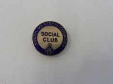 An RAC South Western Counties Social Club blue enamel badge.