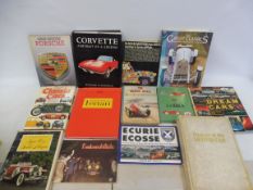 Three large boxes of assorted motoring related volumes.