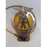 A rarely seen AA motorcycle badge stamped 70640T lighting kit, which was produced in small