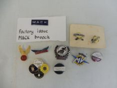 A selection of enamel lapel badges including Morris Commercial, Mack, Triumph, Jawa etc.