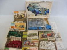 A collection of boxed model car kits, by Matchbox, Pyro, Heller and Airfix, all based on pre-war