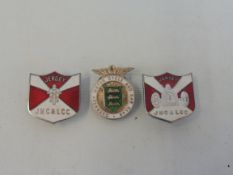 Two Jersey Motor Club and Light Car Club enamel lapel badges plus a Guernsey Motor Cycle and Car