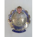 A Monte Carlo XXV Rallye 25th Anniversary part enamel car badge.