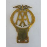 An AA Motorcycle - Cycle Car type 1B badge, brass, no. 270097, June 1920.