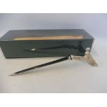 A boxed Rolls-Royce 'spirit of ecstasy' letter opener.