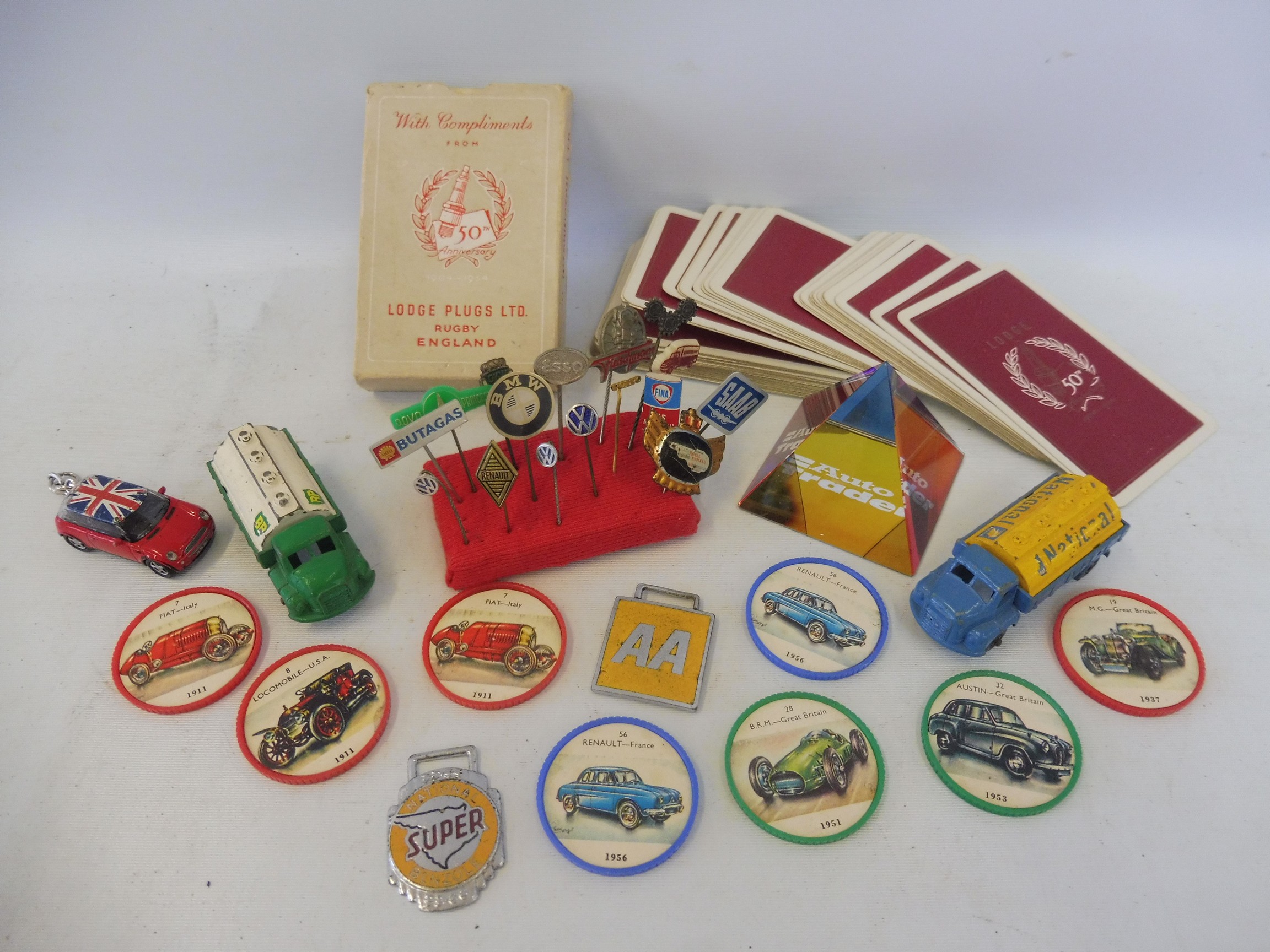 A selection of mixed motoring related items including pin badges for Esso, BMW, VW etc, BP &