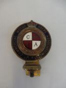 A Commercial Motor Users Association R.A.C. Associate enamelled badge, no 40127, some repair to
