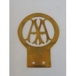 An AA Stenson Cooke official replica brass badge.