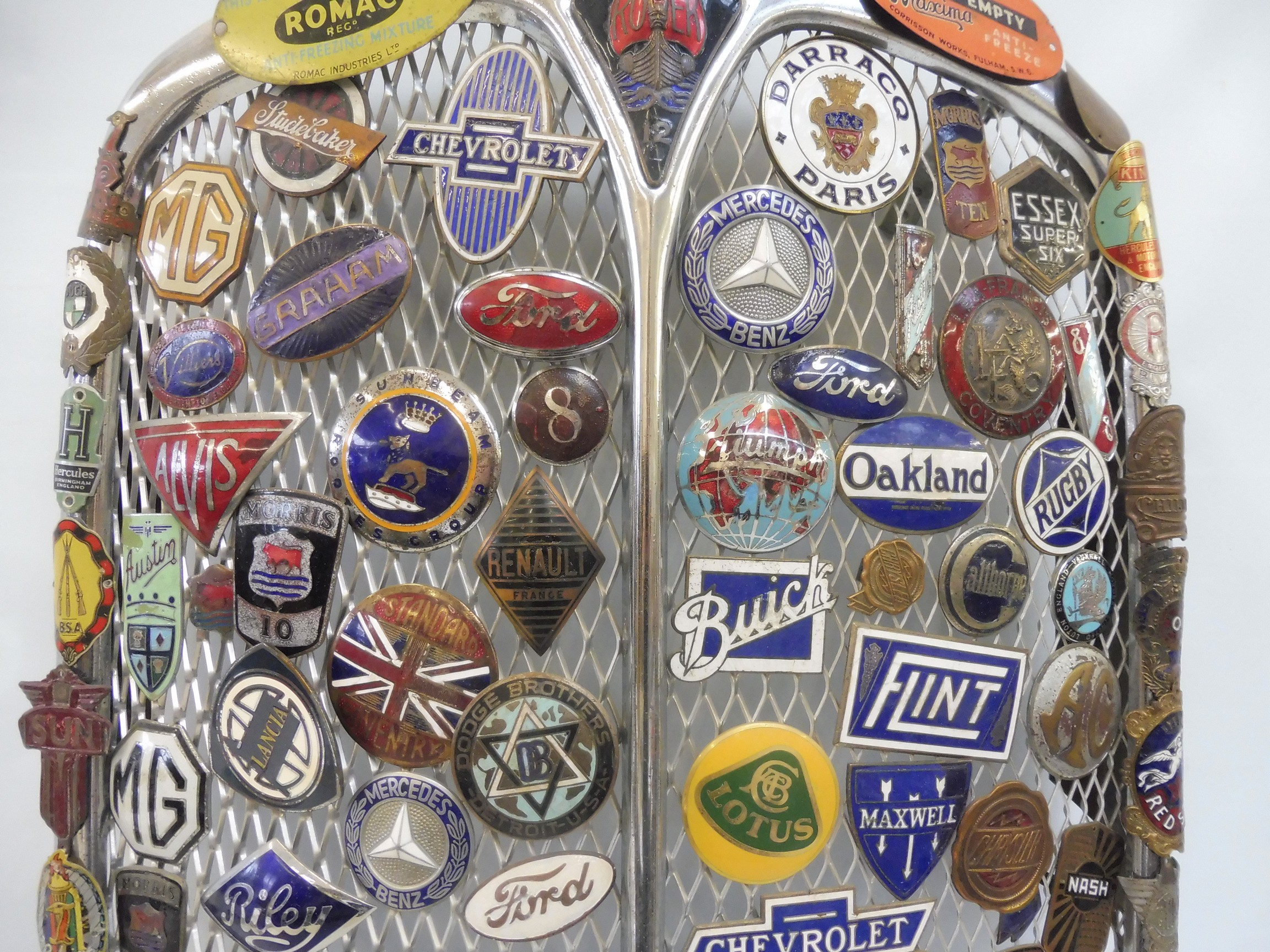 A pre-war Rover radiator grille covered in enamel radiator badges including Darracq, Oakland, Rugby, - Image 3 of 6