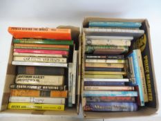 Three large boxes of assorted motoring related volumes.