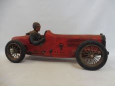 A contemporary large scale model of a pre-war racing car.