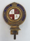 A Commercial Motor Users Association R.A.C. Associate brass and enamel car badge, no. 13625, some