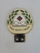An ACU Road Safety Award chrome plated and enamel car badge, stamped to reverse: Presented by