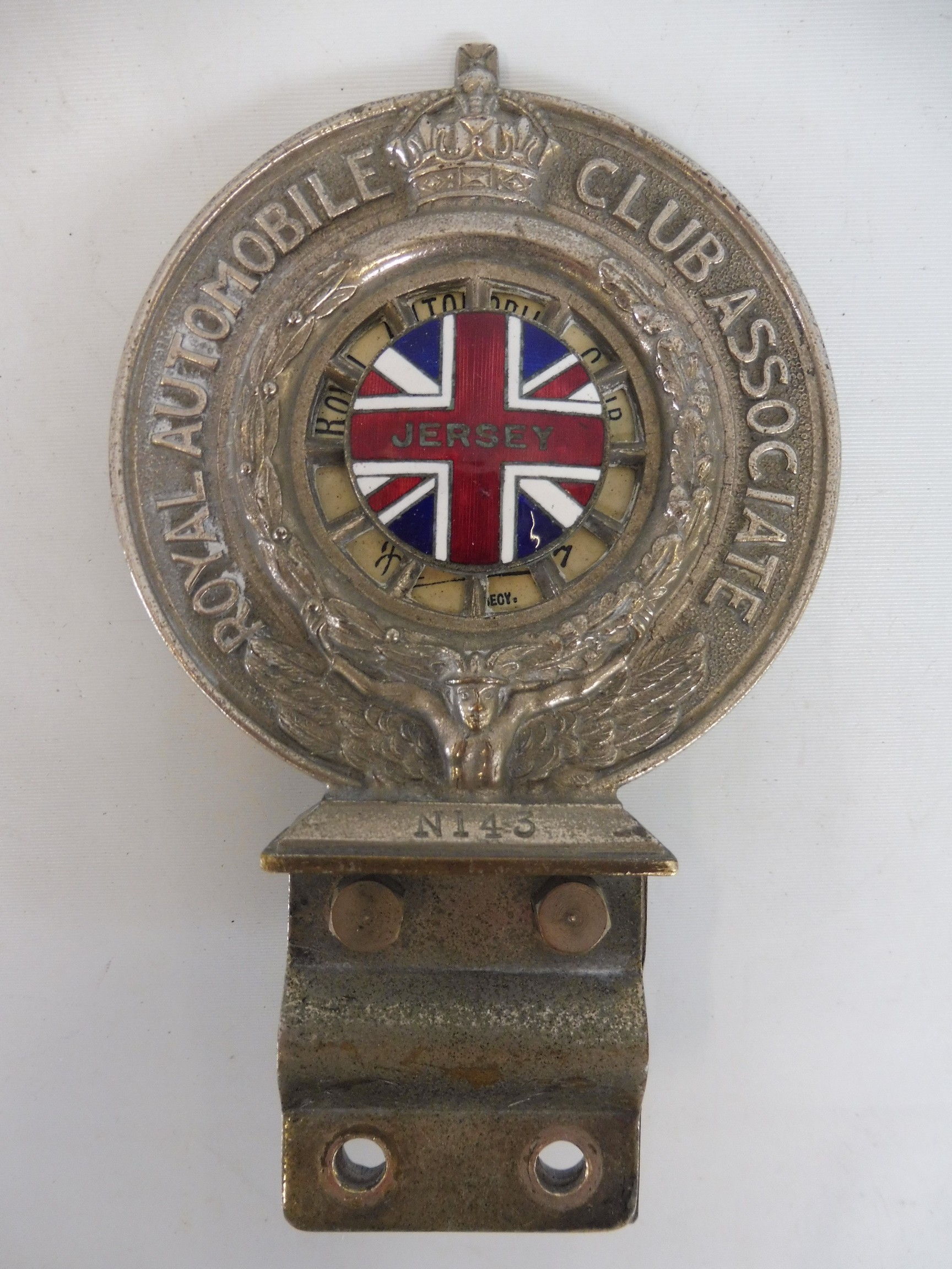 A Royal Automobile Club Associate car badge, nickel plated on brass with rare Jersey enamel union