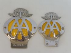 A large AA Jersey car badge, no OJ10031 and one smaller for motorcycles OJJ1180.