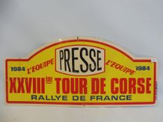 A Tour de Corse/Rally Corisca 1984 press plate and RAC Rally service pass.