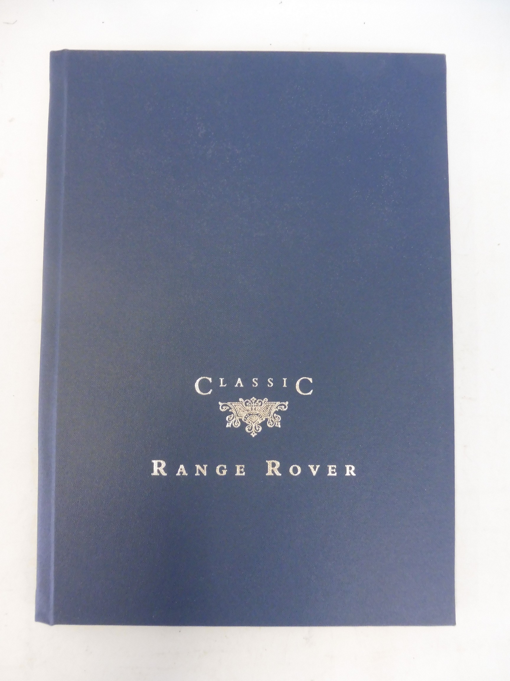 A Land Rover 'Range Rover Classic' leather bound brochure in original sleeve of issue. - Image 3 of 3