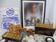 A quantity of motoring related collectables, to include several tyre ashtrays, a boxed puzzle, place