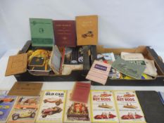 Two boxes of assorted motoring ephemera to include spare parts catalogues, handbooks, magazines etc.