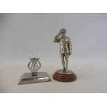 A white metal figure of a saluting AA patrolman, on a wooden base, 4" tall, plus a small E.P.N.S.