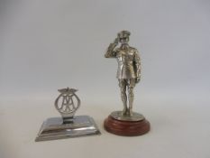 A white metal figure of a saluting AA patrolman, on a wooden base, 4" tall, plus a small E.P.N.S.