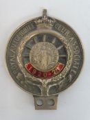 A Royal Automobile Club Associate Auto Cycle Union badge with enamel date of 1920-21, stamped R7