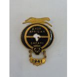 An AA East Africa Safari enamel lapel badge by W.C. Lewis with a 1941 date bar attached.